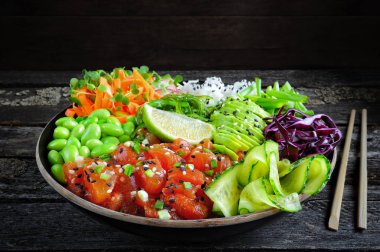 Vegan poke bowl with marinated watermelon, edamame, avocado, sea