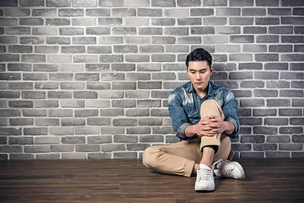 Man sit on ground feel lonely — Stock Photo, Image