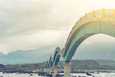 Famous bridge at Sanxiantai clipart