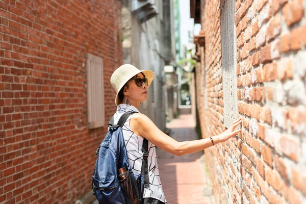 Woman walking in the old street at Lukang town — Stock Photo, Image