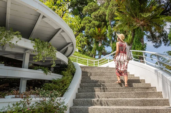 Woman walking at a stairs — Stock Photo, Image