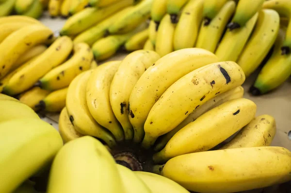 Banana fruit stacked on the marketplace — Stock Photo, Image