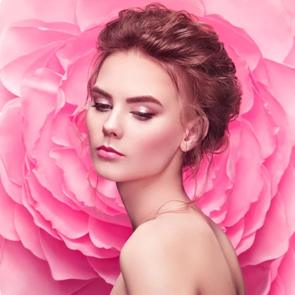Beautiful woman on the background of a large flower — Stock Photo, Image