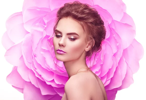 Beautiful woman on the background of a large flower — Stock Photo, Image