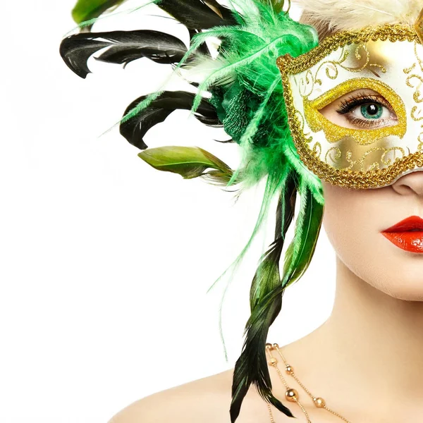 神秘的な黄金ベネチアン マスクの美しい若い女性 ロイヤリティフリーのストック画像