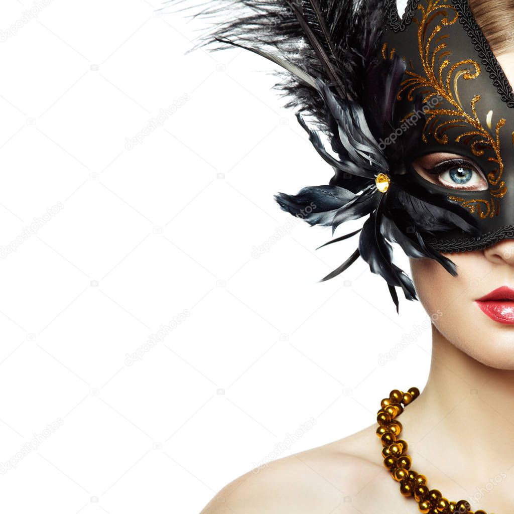 Beautiful young woman in black mysterious venetian mask 