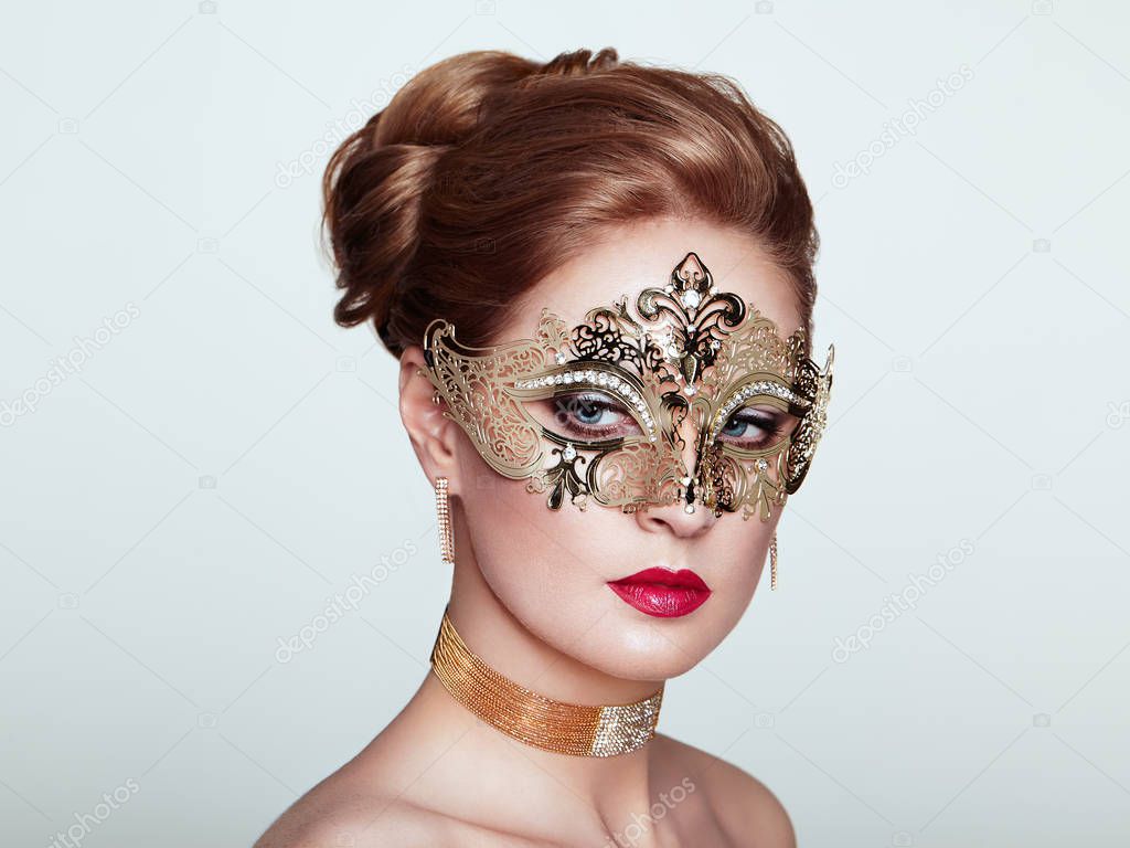 Beautiful woman in venetian masquerade mask
