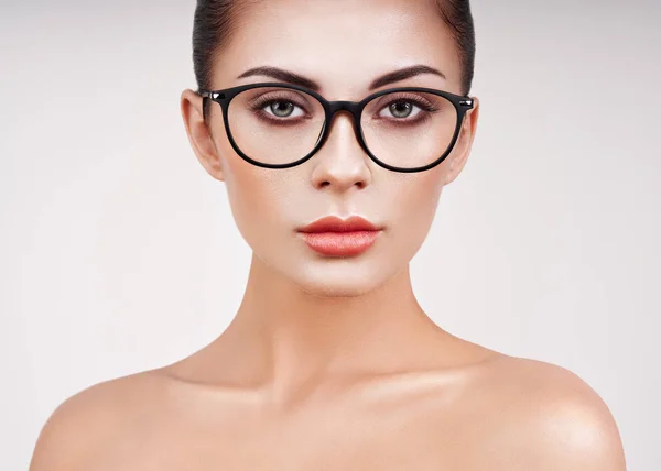 Woman with long eyelashes in eyeglasses — Stock Photo, Image