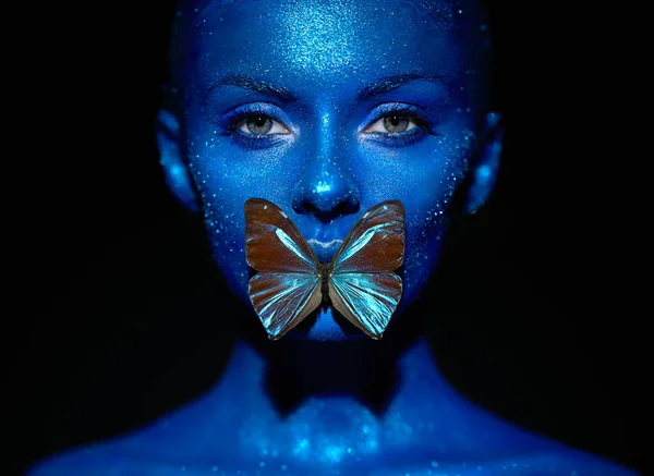 Fashion model woman with blue butterfly — 스톡 사진