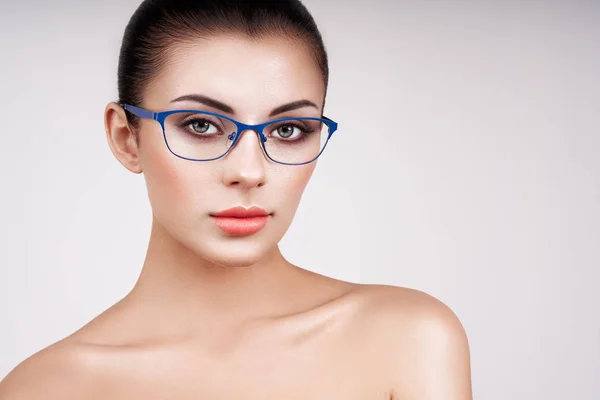 Woman with long eyelashes in eyeglasses — Stock Photo, Image