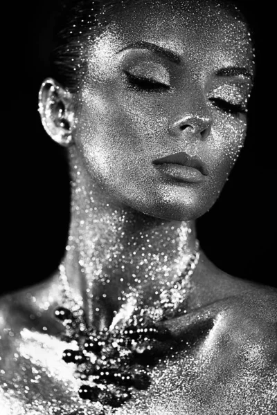 Portrait of beautiful woman with sparkles on her face — Stock Photo, Image