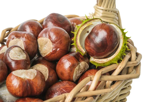 Chestnuts in wicker basket — Stock Photo, Image