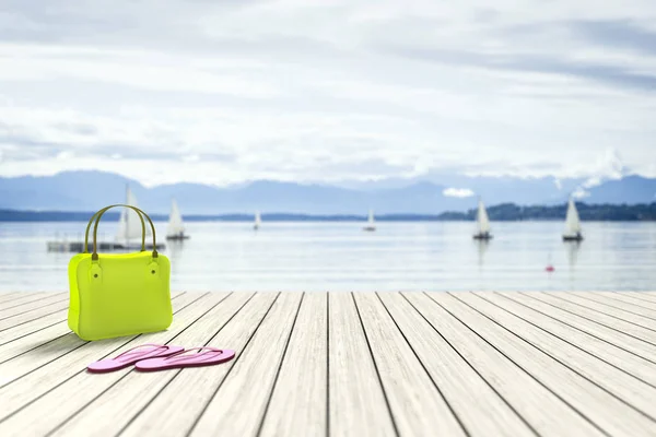 Green bag on a wooden jetty — Stock Photo, Image
