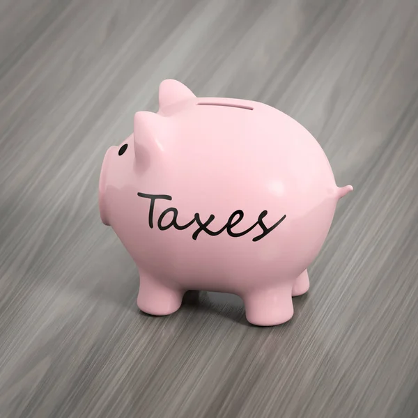 Piggybank with word taxes — Stock Photo, Image