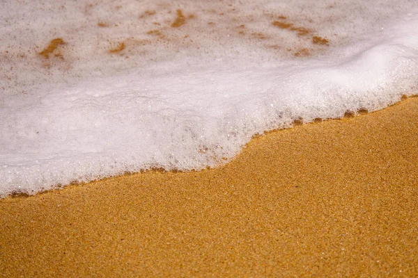 砂浜の海岸線の質感の背景のイメージ — ストック写真