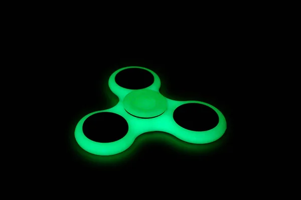 Glowing in the dark fidget spinner — Stock Photo, Image
