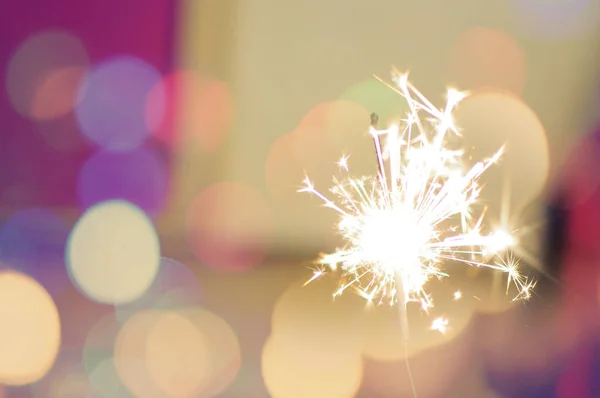 Sparkle stick no fundo do feriado Imagens Royalty-Free