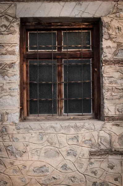 Old window on stone wall — Stock Photo, Image