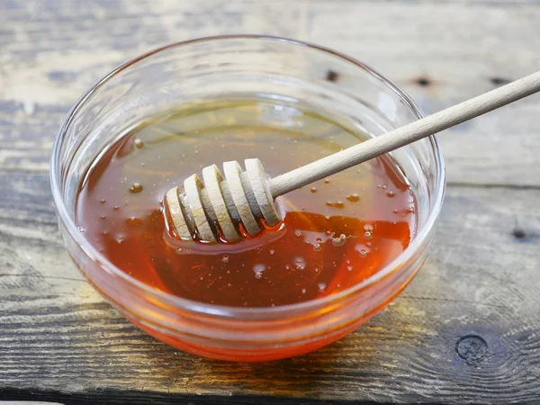 Dish of honey — Stock Photo, Image