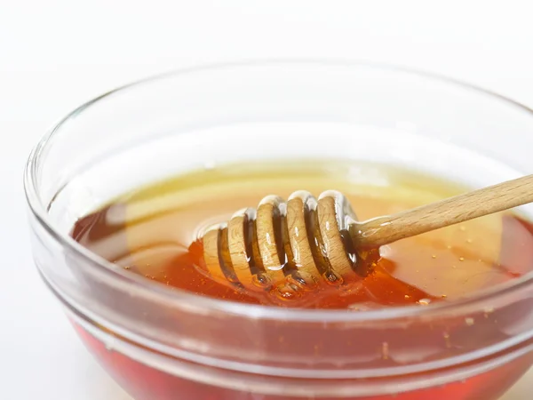 Dish of honey — Stock Photo, Image