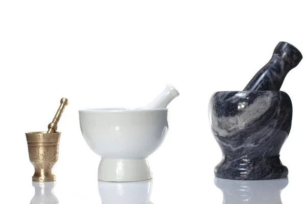 Brass porcelain and marble mortars — Stock Photo, Image