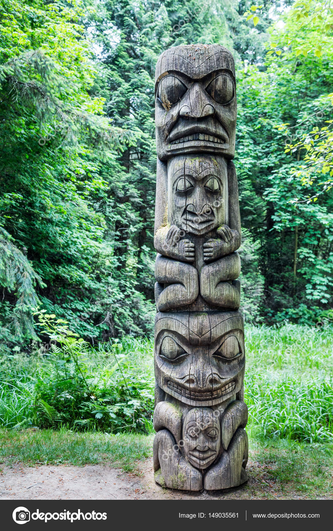 Four Totem Heads On Pole Stock Photo By C Dbvirago