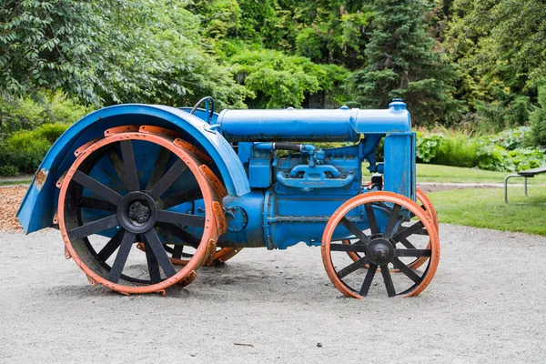 Blue Tractor in Sand Royalty Free Stock Images