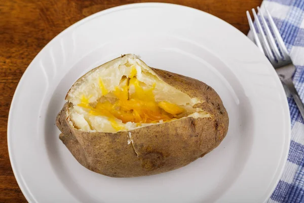 Cheesy Baked Potato on White Plate — Stock Photo, Image