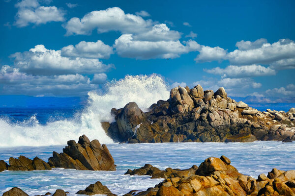 Surf Crashing Against Rocks