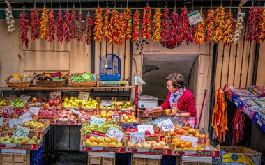 Woman Working Produce Stand