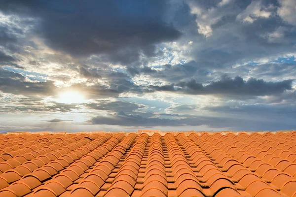 Red Tiles and Stormy Sunset — Stock Photo, Image