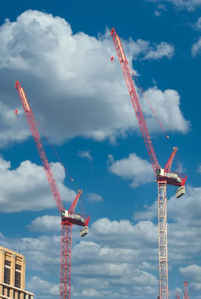 Two Red Cranes on Blue Sky — Stock Photo, Image