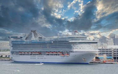 White Luxury Cruise Ship in Port