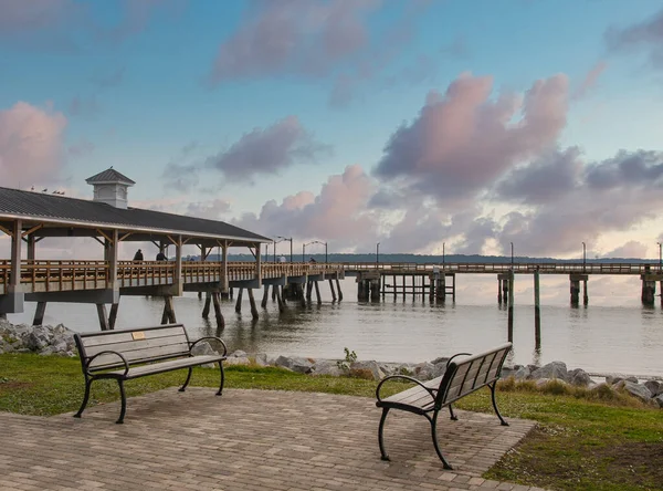 Empty Benches by a Winter Pier — Stok fotoğraf