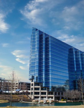 Blue Angled Office Building by Lake