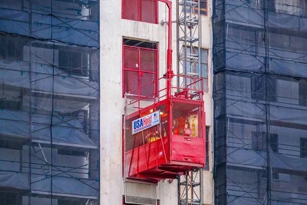 Elevador de construção de talha EUA — Fotografia de Stock