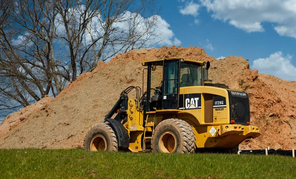 CAT Heavy Equipment by Dirt PIle — Stock Photo, Image