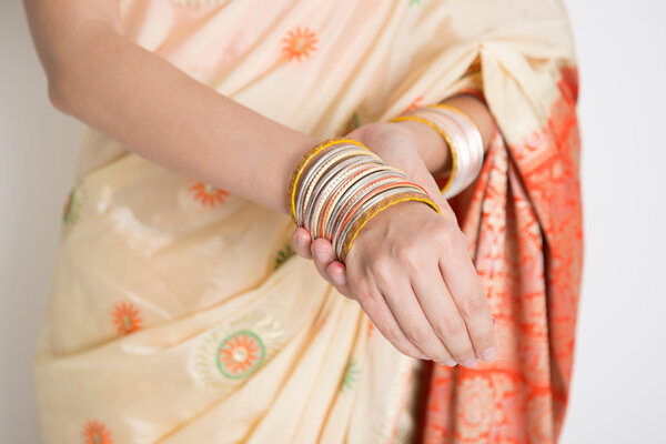Woman in Indian sari dress wearing bangles