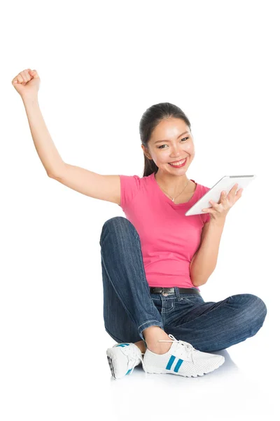 Young Asian teen student using tablet pc — Stock Photo, Image