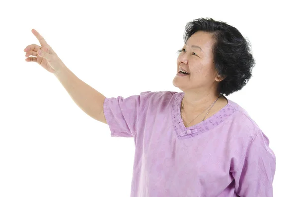 Senior adult woman finger pointing — Stock Photo, Image