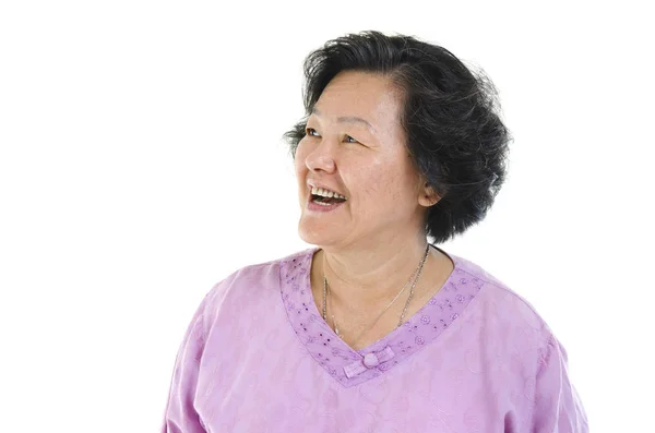 Senior adult woman looking at side — Stock Photo, Image