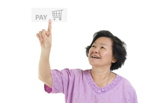 Senior adult woman wijzend button betalen — Stockfoto