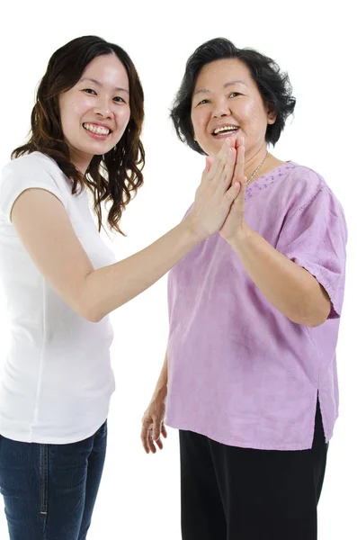 Mother and daughter high five — Stock Photo, Image