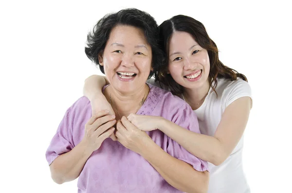 Senior mother and adult daughter Stock Image