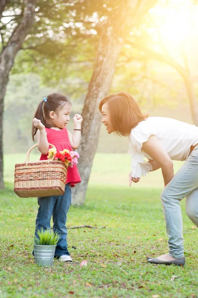 Mother and daughter lifestyle in nature park. Stock Picture