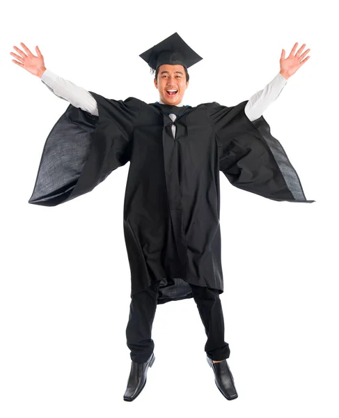 Graduate university student jumping high — Stock Photo, Image