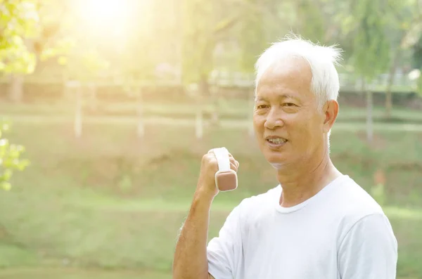 Asian senior man exercise outdoor — Stock Photo, Image