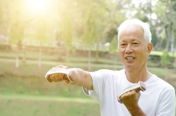 Asian senior people exercise outdoor