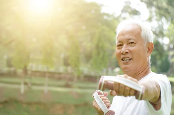 Asian old people exercise outdoor