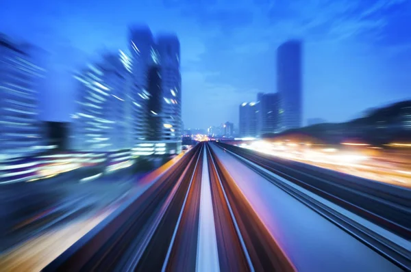 High speed train passing in between Kuala Lumpur City — Stock Photo, Image